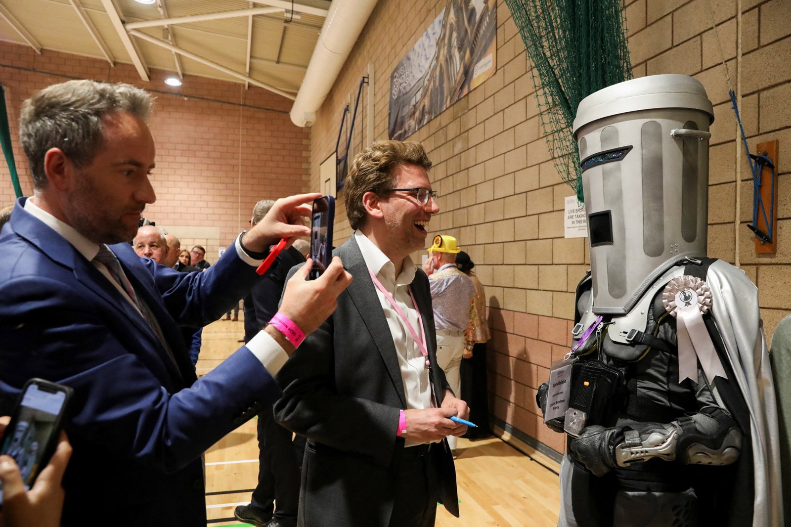 Man with bin over his head
